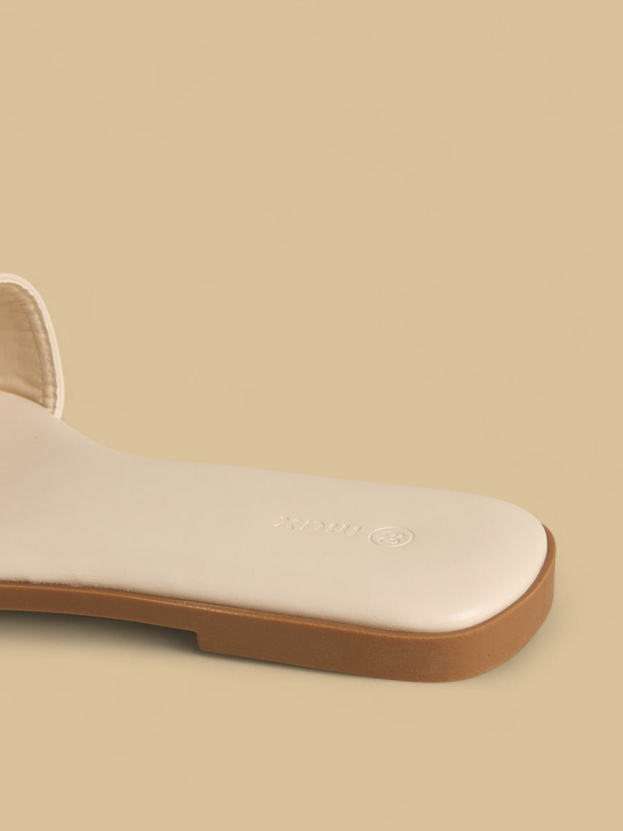 Metal accent slip-on flat sandals