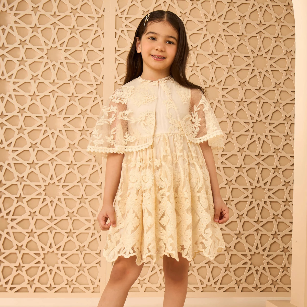 Embroidered dress with cape