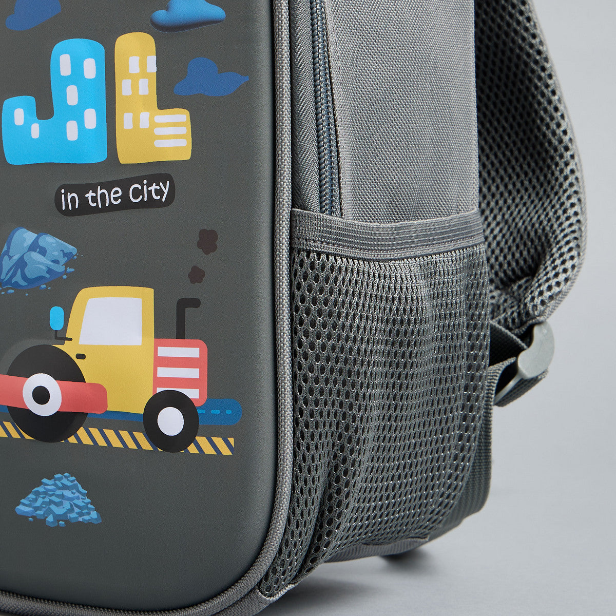 Construction vehicle print backpack with adjustable straps and zip closure