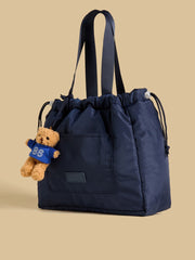 Bear charm shopper bag with drawstring closure