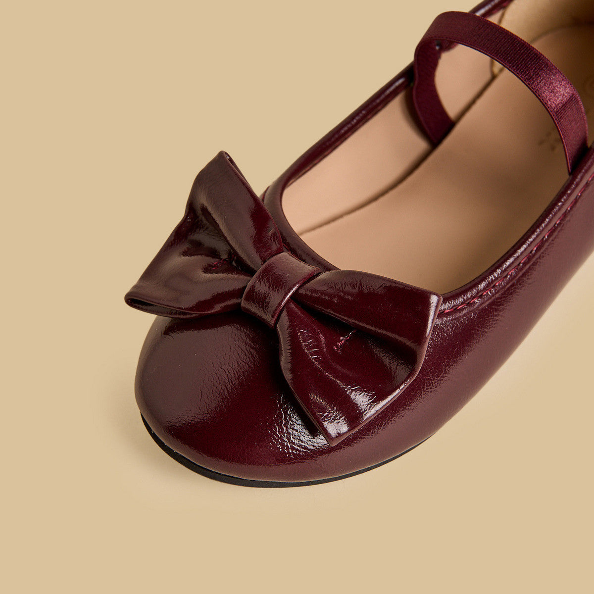 Bow accent ballerina shoes with Elasticated strap