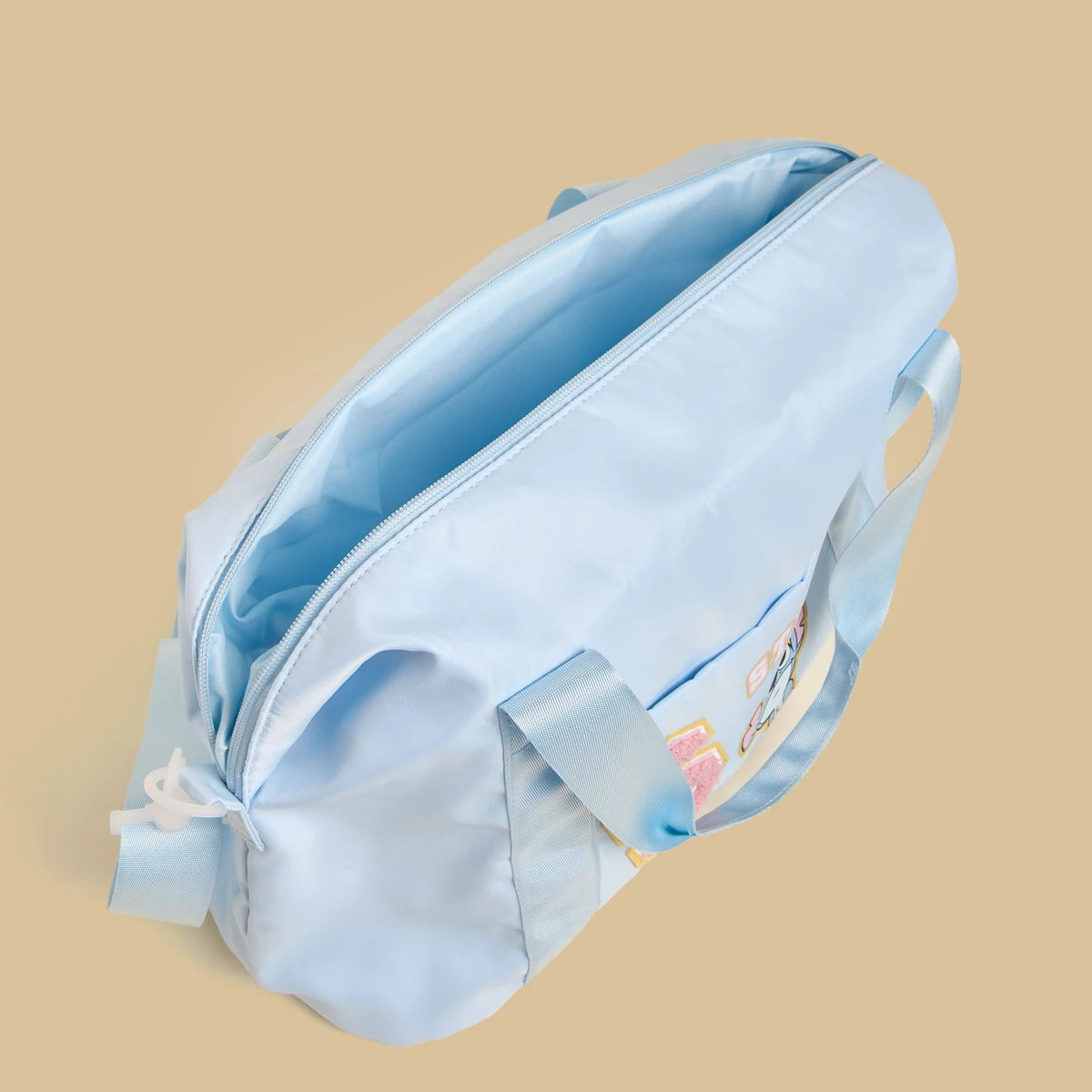 Stitch print duffle bag with zip closure