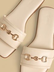 Metal accent slip-on flat sandals