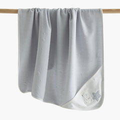 Giggles moon and star embossed receiving blanket