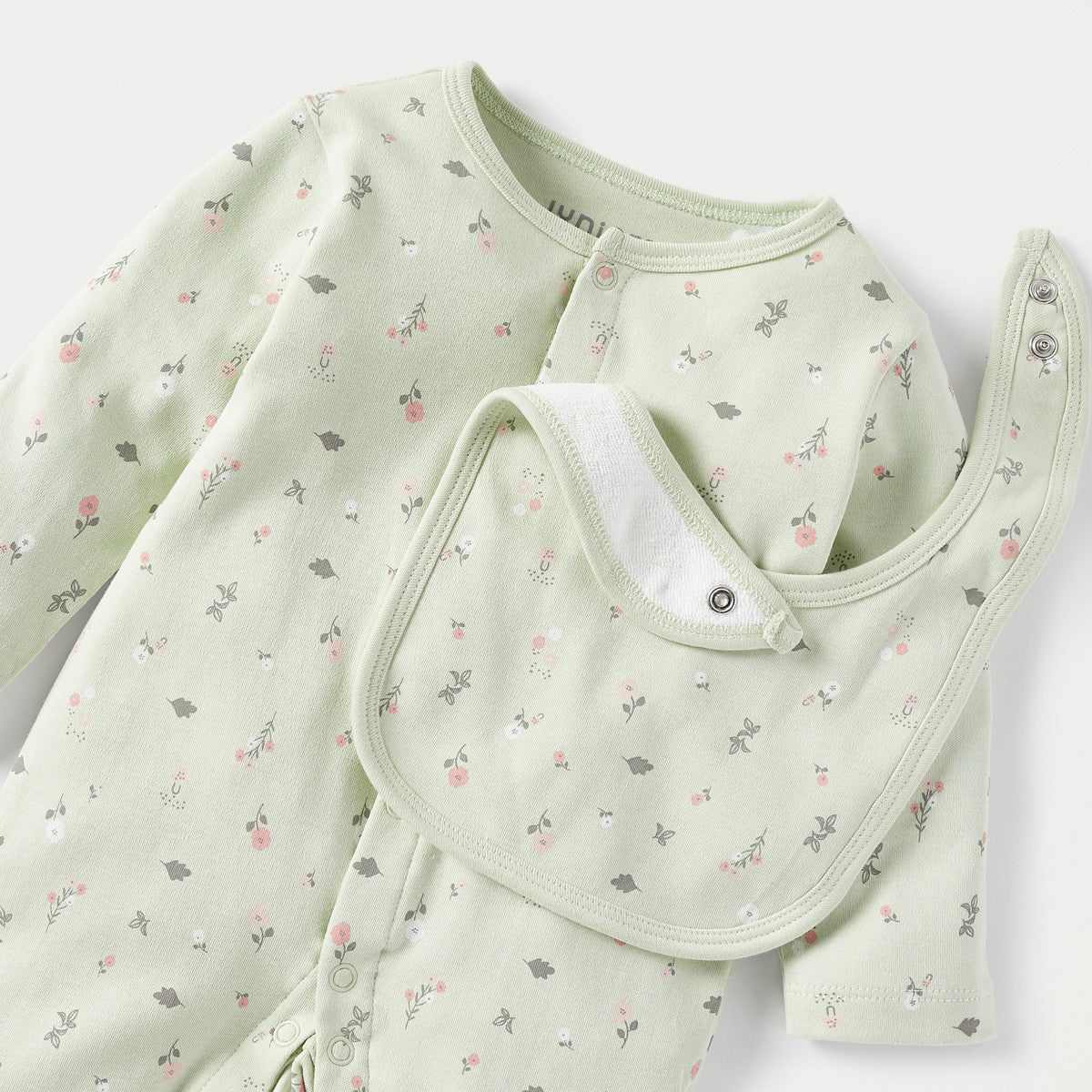 Juniors all- over floral print sleepsuit with long sleeves and bib