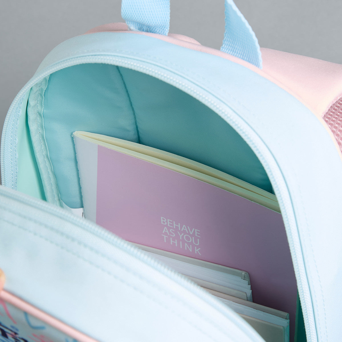 Stitch print backpack with adjustable shoulder straps and zip closure