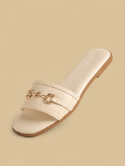 Metal accent slip-on flat sandals