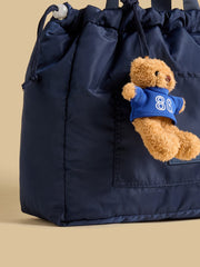 Bear charm shopper bag with drawstring closure